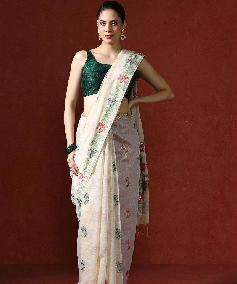Cream woven design saree with blouse