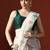 Cream woven design saree with blouse