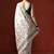 Cream woven design saree with blouse