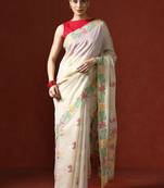 Cream woven design saree with blouse
