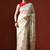 Cream woven design saree with blouse