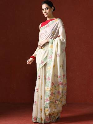 Cream woven design saree with blouse 3