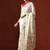 Cream woven design saree with blouse