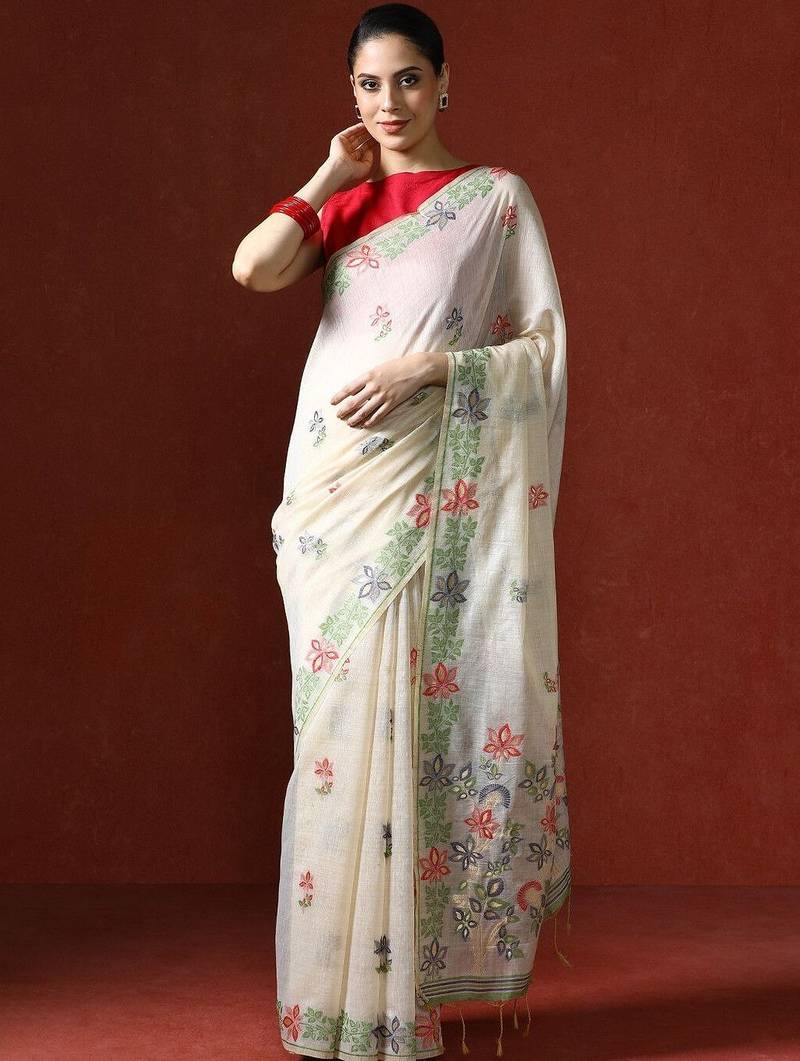 Cream woven design saree with blouse