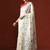 Cream woven design saree with blouse