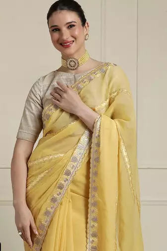 Yellow zari saree with blouse