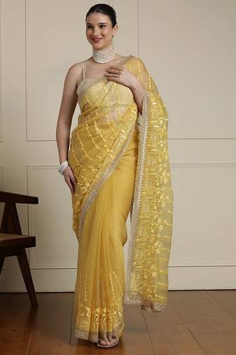 Yellow women ethnic motifs embroidered saree