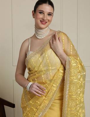 Yellow women ethnic motifs embroidered saree 4