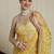 Yellow women ethnic motifs embroidered saree