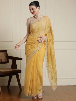 Yellow ethnic motifs embroidered scallop zari border saree 1