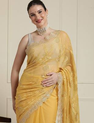 Yellow ethnic motifs embroidered scallop zari border saree 4