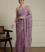 Purple ethnic motifs embroidered saree