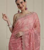 Pink floral motif embroidered beads and stones saree