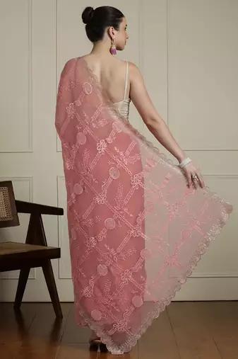 Pink floral motif embroidered beads and stones saree
