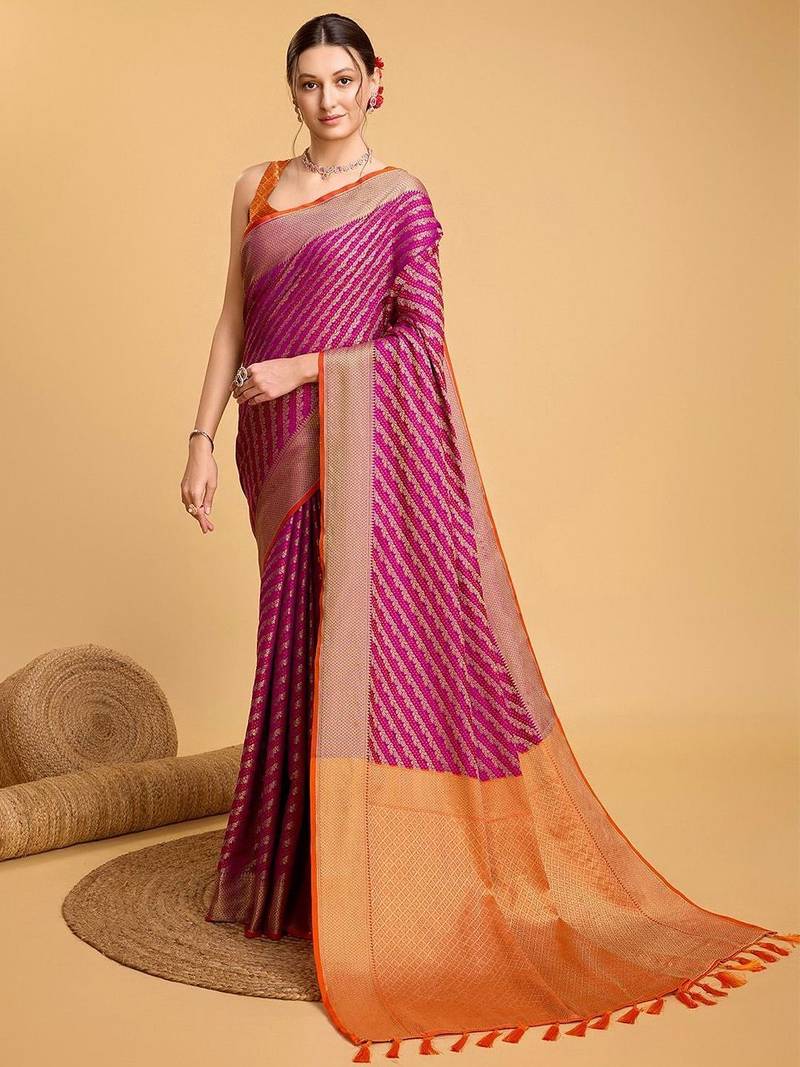 Pink woven embellished art silk leheria saree with blouse piece