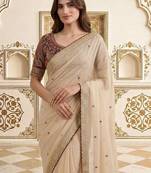 Cream embellished embroidered saree