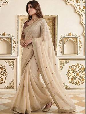Cream embellished embroidered saree 2