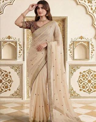 Cream embellished embroidered saree 3