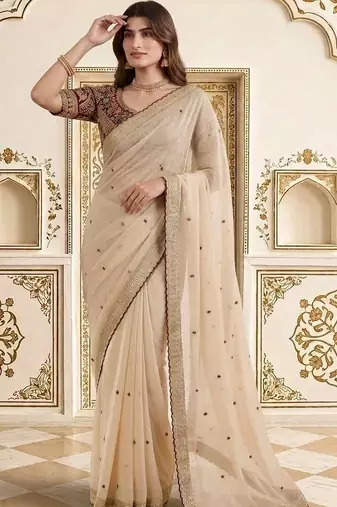 Cream embellished embroidered saree