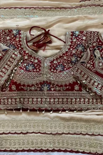 Cream embellished embroidered saree