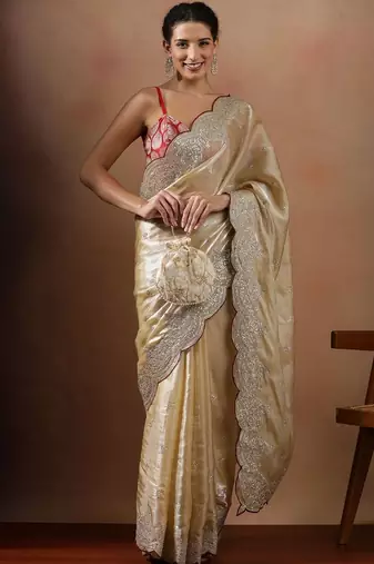 Cream embroidered organza sarees