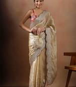 Cream embroidered organza sarees