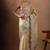 Cream embroidered organza sarees