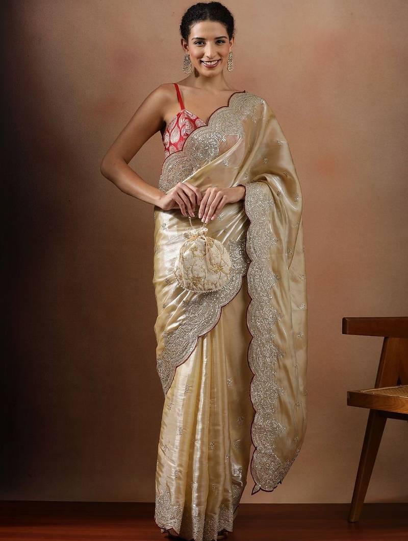 Cream embroidered organza sarees