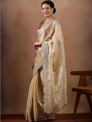 Cream embroidered organza sarees 2