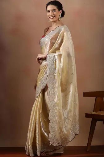 Cream embroidered organza sarees