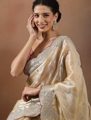 Cream embroidered organza sarees 4