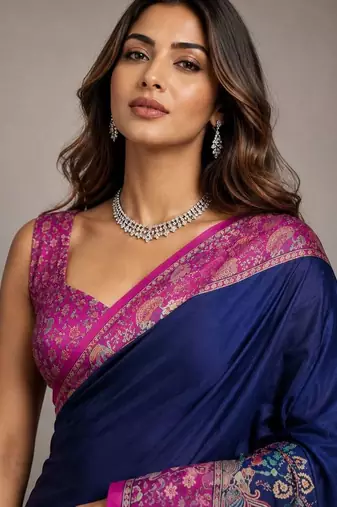 Navy blue paisley embroidered silk blend saree