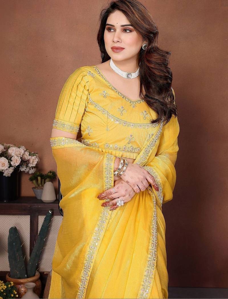Yellow embellished saree with unstitched blouse