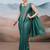 Teal ethnic woven design saree with matching blouse