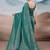 Teal ethnic woven design saree with matching blouse