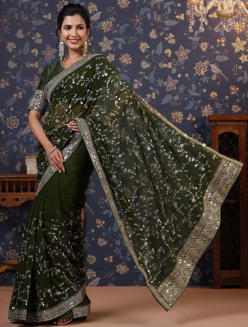 Green sequinned embellished saree with blouse piece