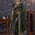 Green sequinned embellished saree with blouse piece