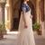 Off white saree with embroidered blouse