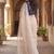 Off white saree with embroidered blouse
