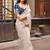 Off white saree with embroidered blouse