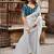 Grey saree with embroidered blouse