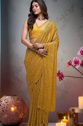 Yellow embroidered embellished saree with unstitched blouse piece