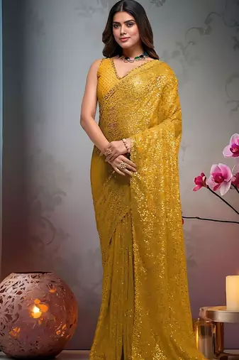 Yellow embroidered embellished saree with unstitched blouse piece