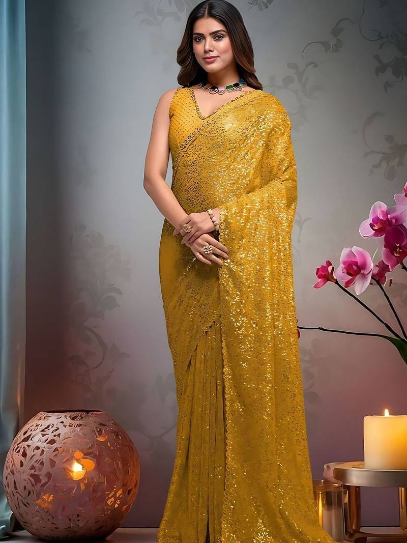 Yellow embroidered embellished saree with unstitched blouse piece
