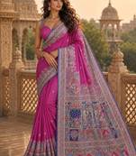 Magenta ethnic motifs embroidered silk blend saree
