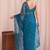 Teal floral sequinned net designer saree