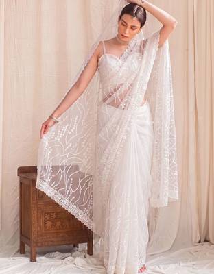 Off white floral sequinned net designer saree 1