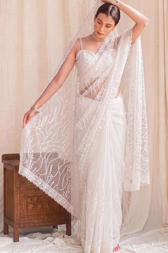 Off white floral sequinned net designer saree