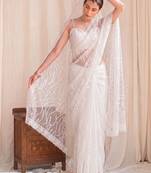 Off white floral sequinned net designer saree