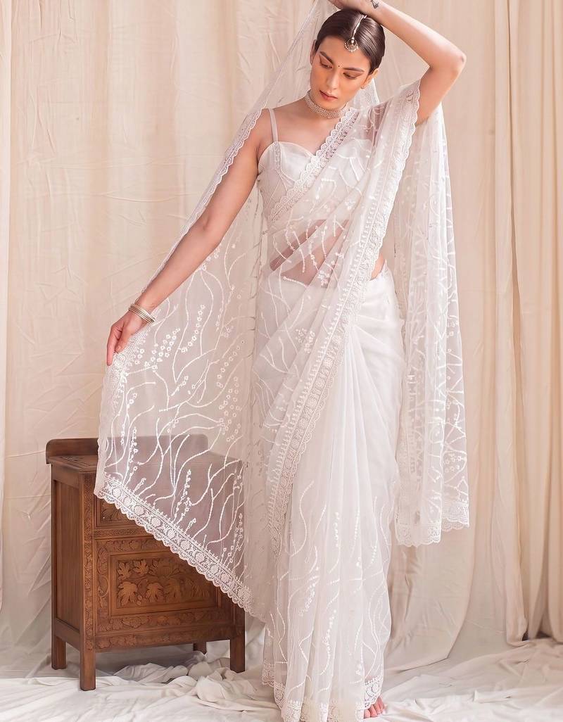 Off white floral sequinned net designer saree